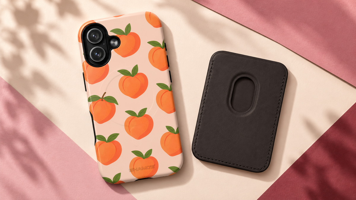 Editorial illustration of Shamo's peach-pattern phone case and a black magnetic wallet arranged separately on a blush background