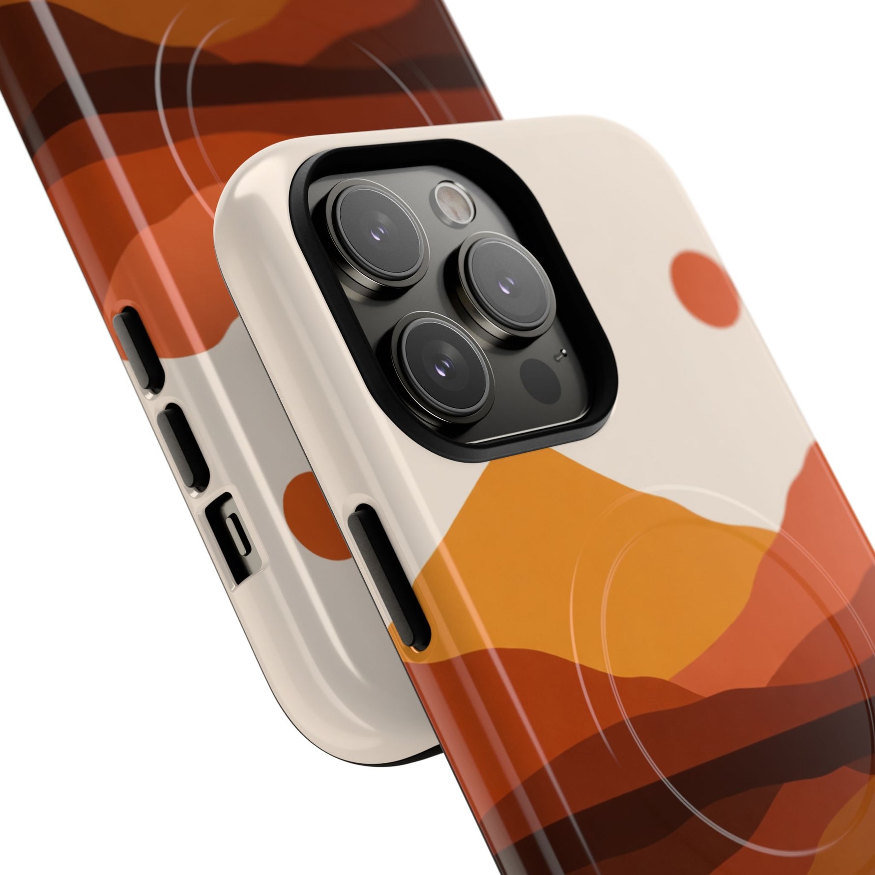 Close-up of two smartphone cases with orange and brown abstract landscape design, showing different sizes