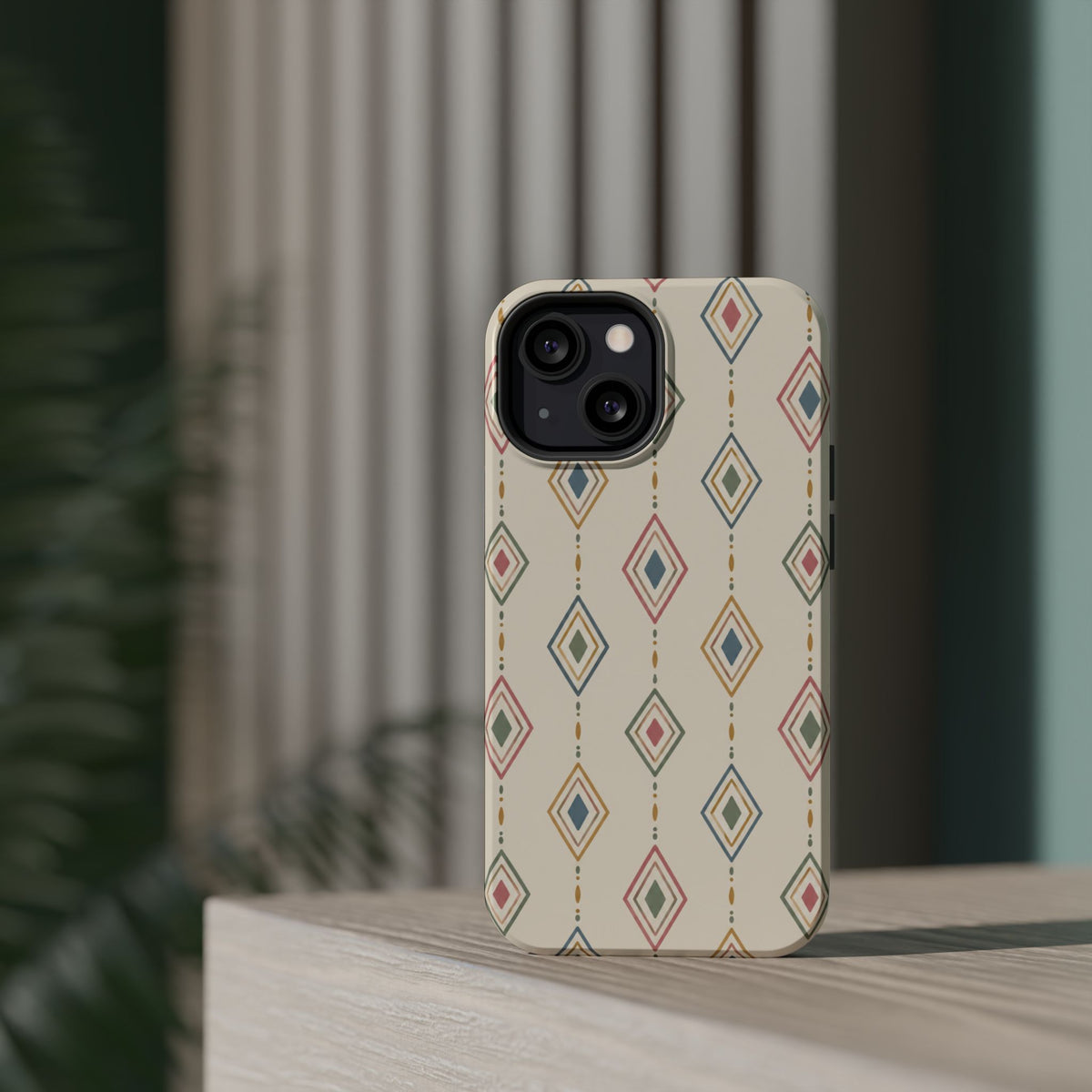 Desert Diamonds – Pastel Geometric Pattern MagSafe Phone Case, glossy diagonal dual-camera model, rear view on a tabletop