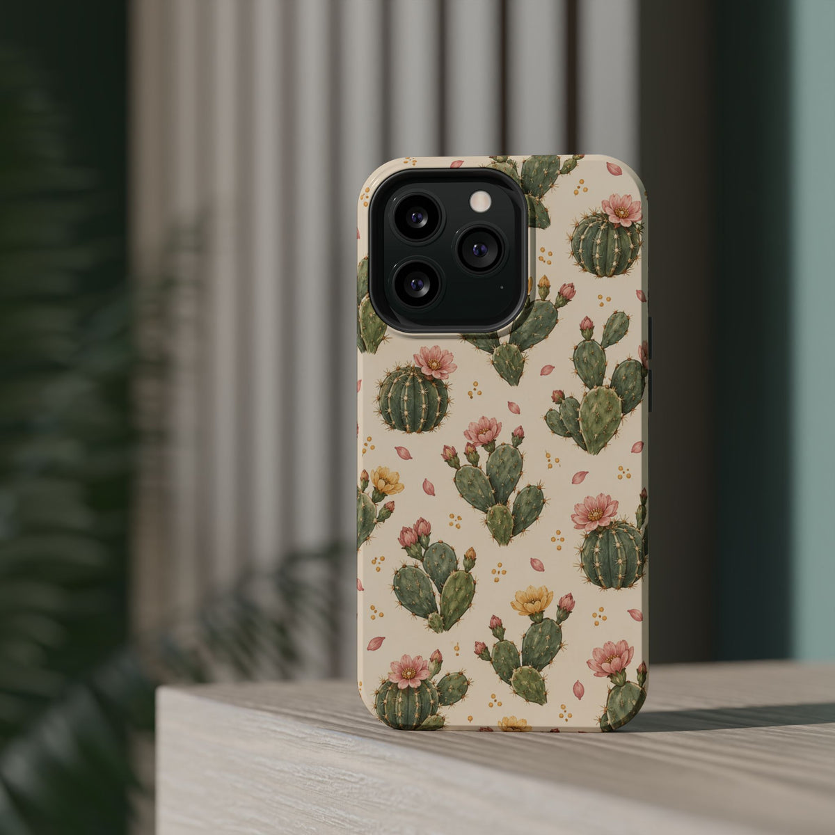 Cactus Bloom – Sage Green Floral Cactus MagSafe Phone Case, glossy square triple-camera Pro model, rear view on a tabletop