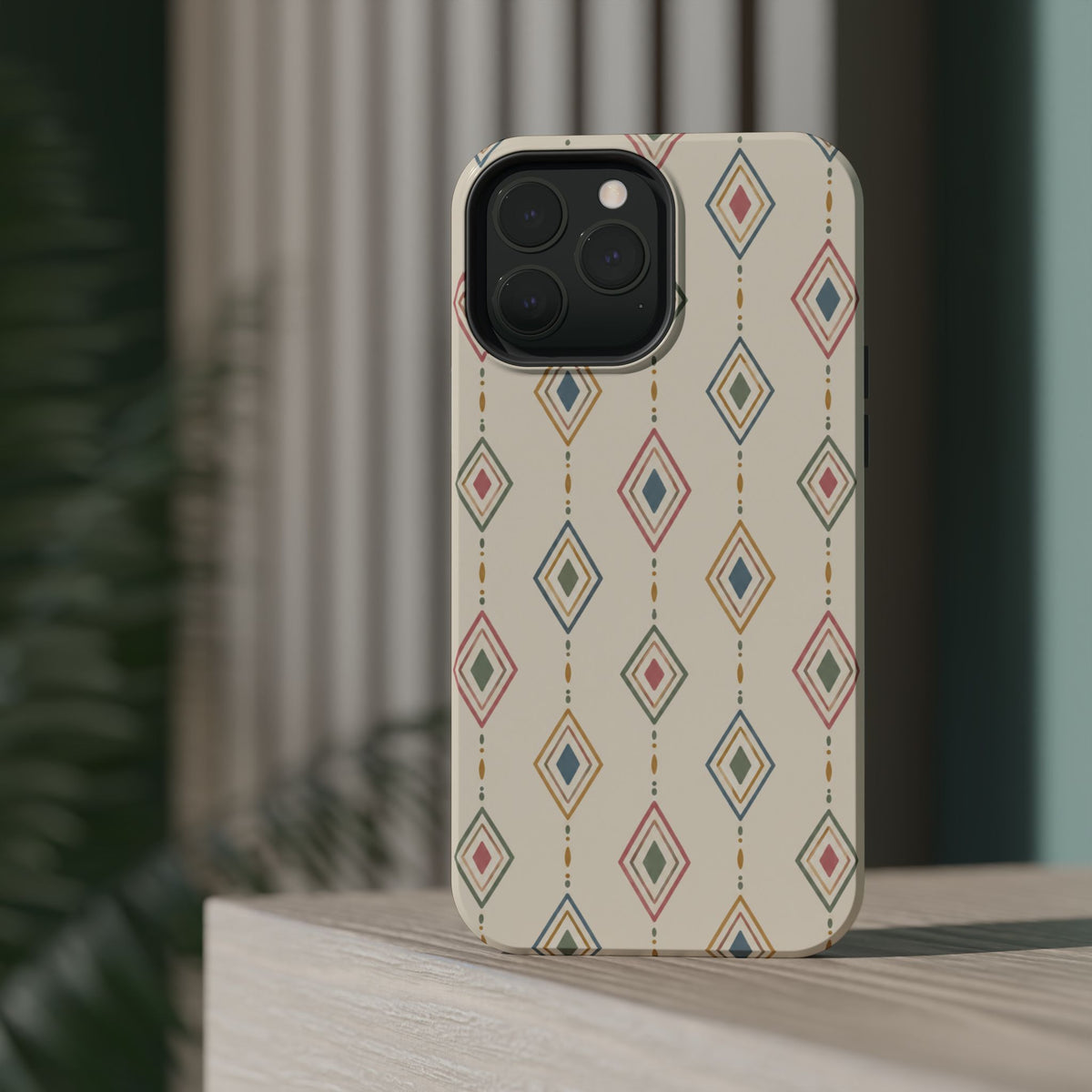 Desert Diamonds – Pastel Geometric Pattern MagSafe Phone Case, glossy square triple-camera Pro model, rear view on a tabletop