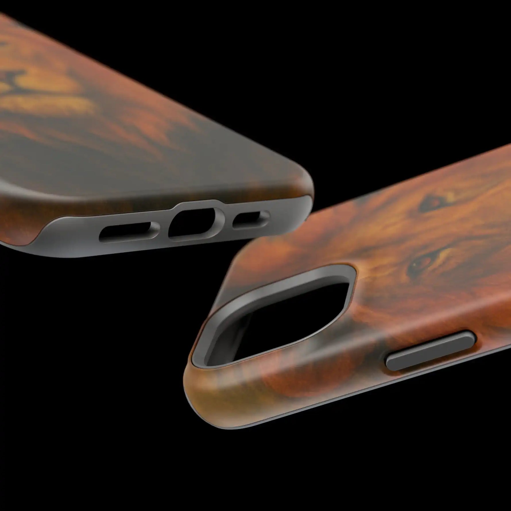 Close-up of two wood grain phone cases showing different size variants with precise cutouts for buttons and ports