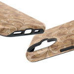 Saddle Scrolls – Tan Western Scrollwork MagSafe Phone Case, glossy vertical dual-camera model, port openings and edge details