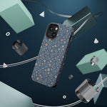 Denim Wildflowers MagSafe Phone Case, glossy diagonal dual-camera model, rear view with magnetic accessories
