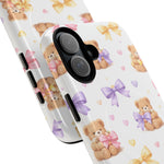 Front and back views of two phone cases with cute teddy bears, pastel bows, and hearts pattern, showing size variant