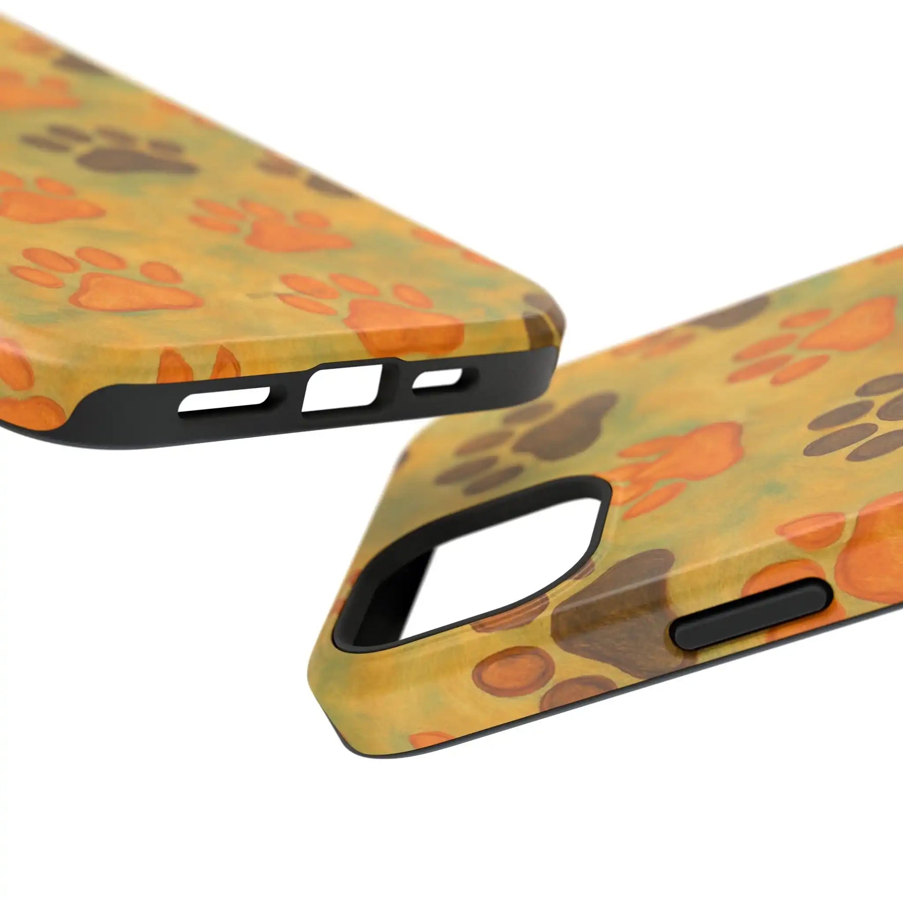 Two sizes of yellow phone cases with orange and brown paw print pattern and black button and camera cutouts