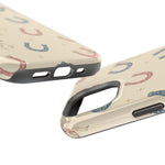 Prairie Horseshoes MagSafe Phone Case, glossy diagonal dual-camera model, port openings and edge details