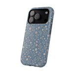 Denim Wildflowers MagSafe Phone Case, glossy wide-camera Pro model, angled rear view