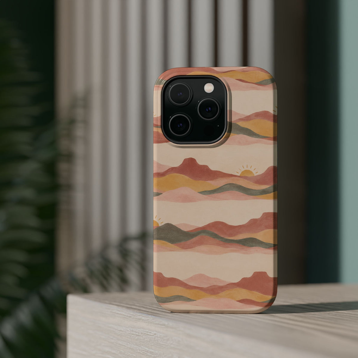 Sunset Trails – Desert Landscape MagSafe Phone Case, glossy square triple-camera Pro model, rear view on a tabletop