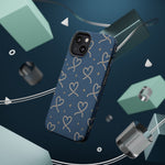 Lasso Hearts – Blue Western Heart MagSafe Phone Case, glossy diagonal dual-camera model, rear view with magnetic accessories