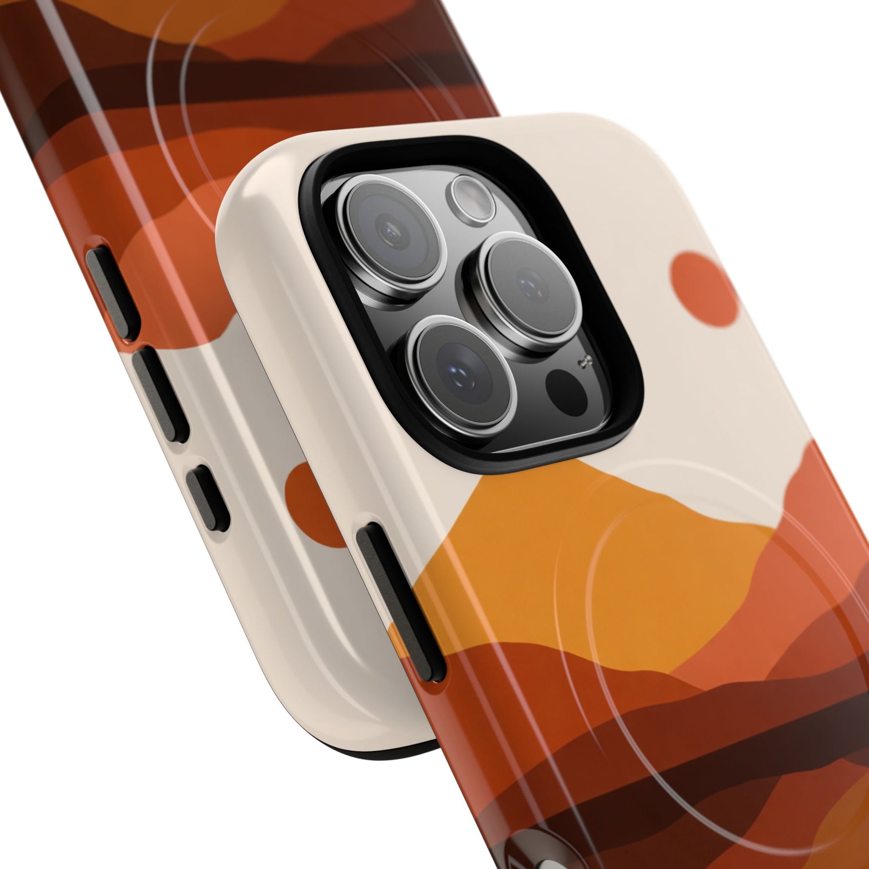 Close-up of two iPhone cases in different variant sizes with orange and brown abstract landscape design