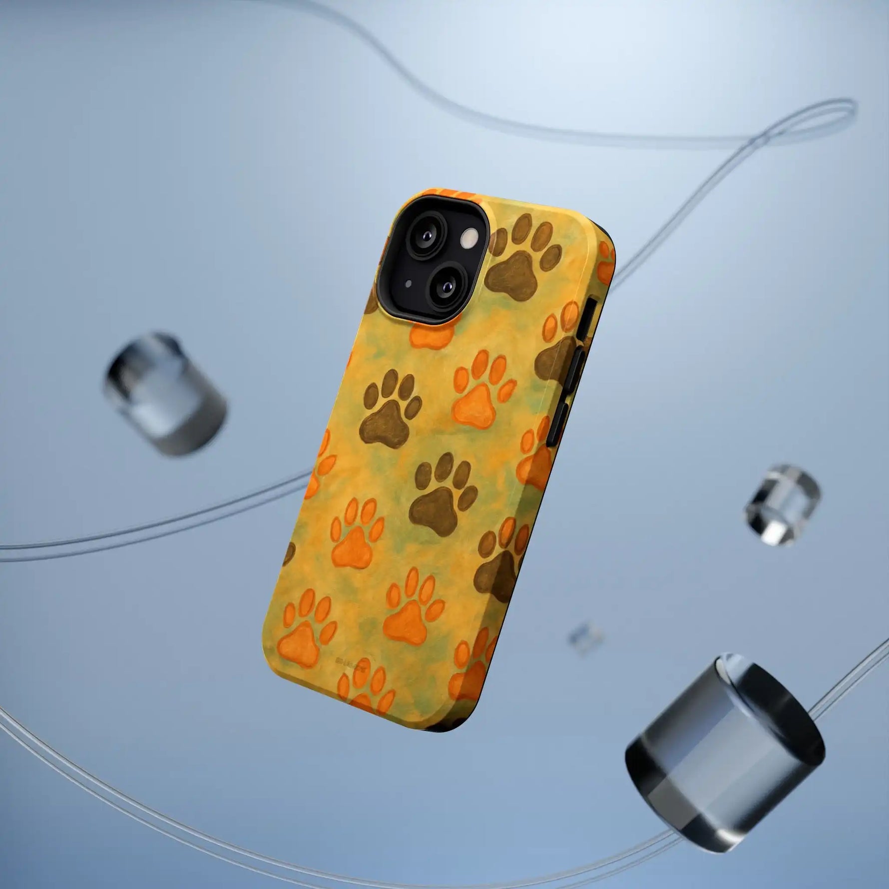 Yellow iPhone case with orange and brown paw print pattern, medium variant size shown