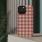 Prairie Gingham MagSafe Phone Case, glossy square triple-camera Pro model, rear view on a tabletop