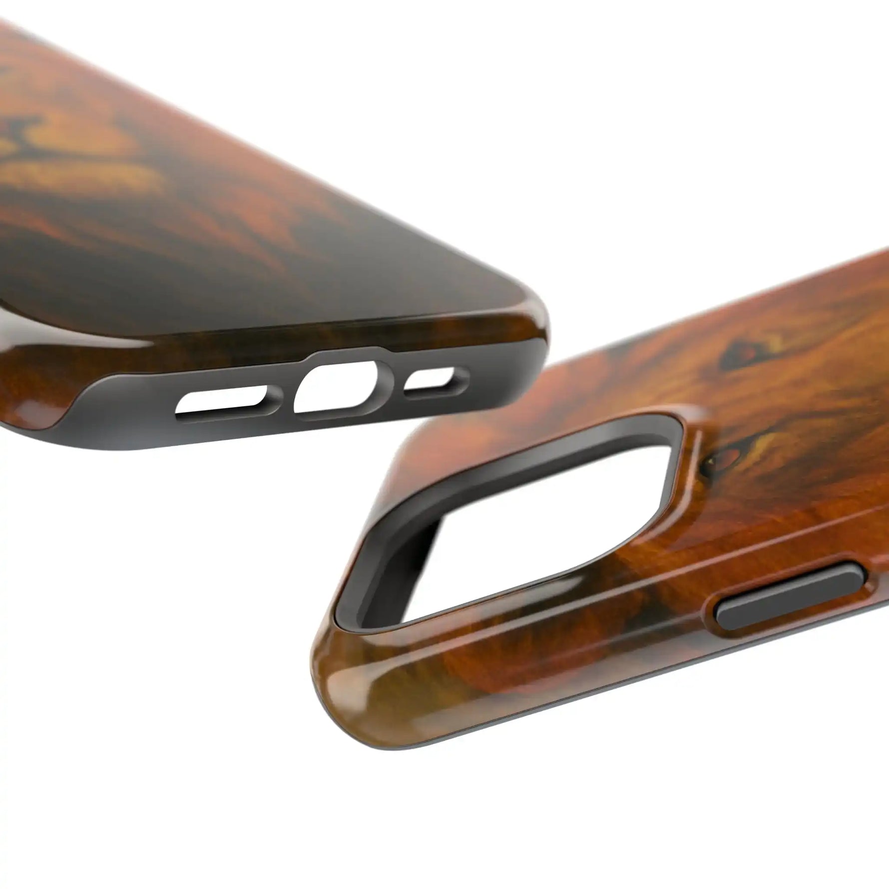 Close-up of two wooden textured phone cases showing different sizes and precise port and camera cutouts