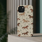 Wild Mustangs – Western Horse Pattern MagSafe Phone Case, glossy diagonal dual-camera model, rear view on a tabletop