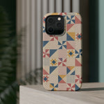 Prairie Quilt – Pastel Patchwork Pattern MagSafe Phone Case, glossy square triple-camera Pro model, rear view on a tabletop