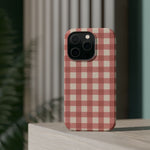 Prairie Gingham MagSafe Phone Case, glossy square triple-camera Pro model, rear view on a tabletop