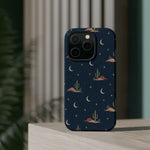 Desert Moon MagSafe Phone Case, glossy square triple-camera Pro model, rear view on a tabletop