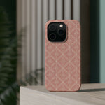 Meadow Lace – Blush Pink Lace Pattern MagSafe Phone Case, glossy square triple-camera Pro model, rear view on a tabletop