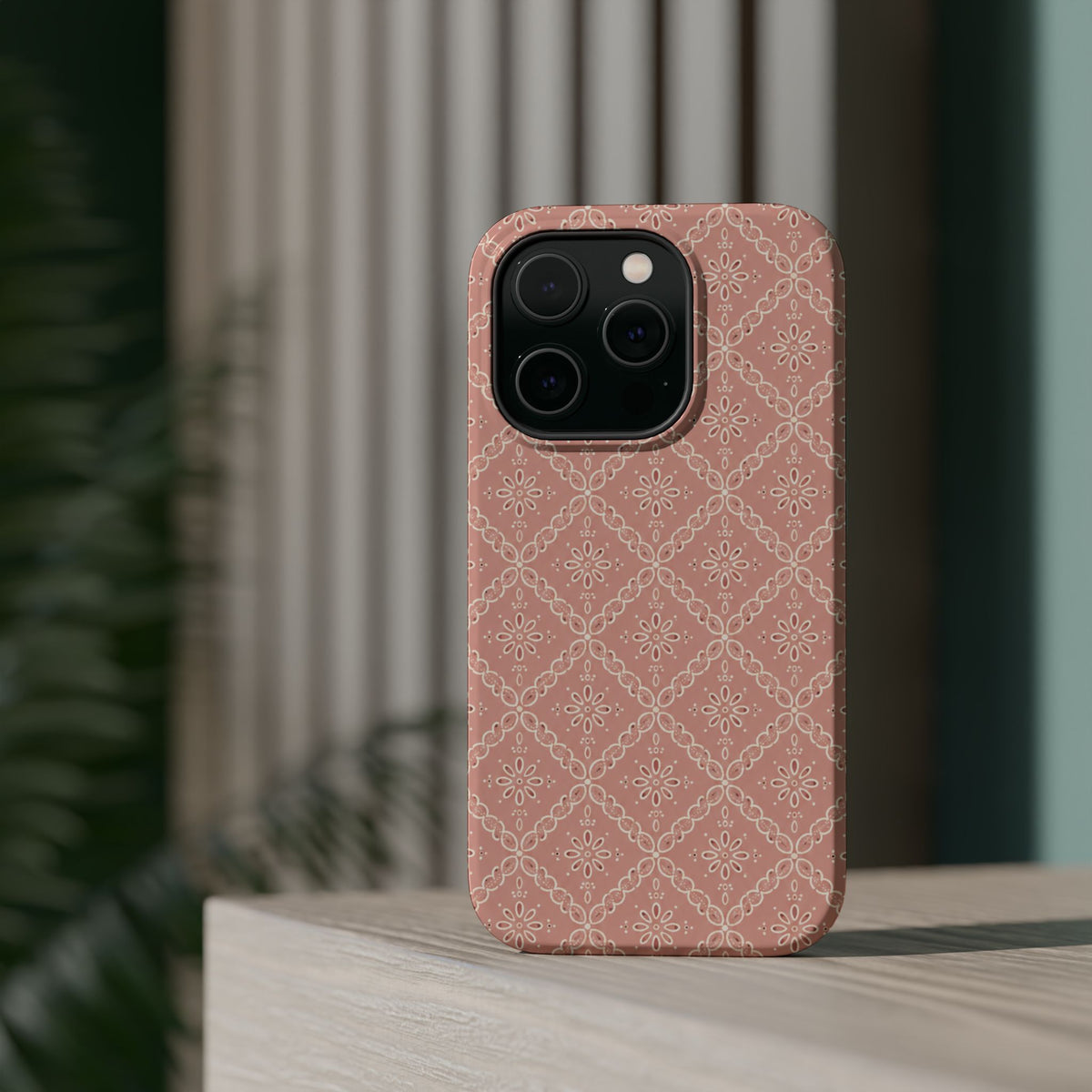 Meadow Lace – Blush Pink Lace Pattern MagSafe Phone Case, glossy square triple-camera Pro model, rear view on a tabletop