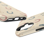 Prairie Horseshoes MagSafe Phone Case, glossy vertical dual-camera model, port openings and edge details