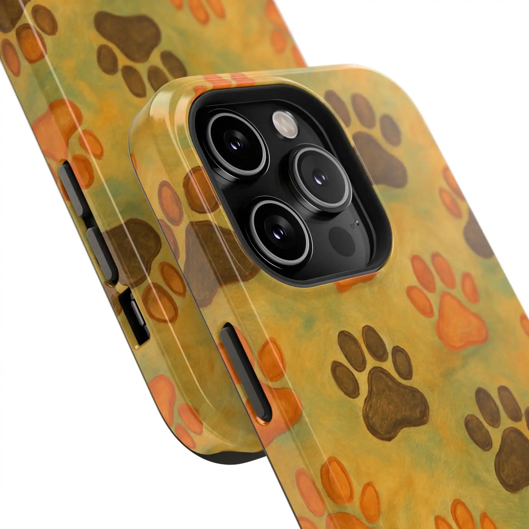 Close-up of two iPhone cases with orange and brown paw print design, showing variant size