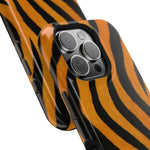 Two tiger stripe patterned phone cases showing camera cutout variant sizes for smartphones