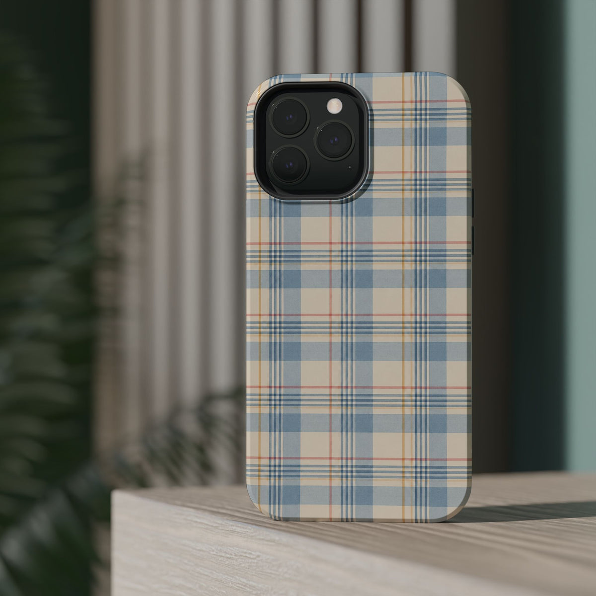Ranch Check – Blue and Cream Plaid MagSafe Phone Case, glossy square triple-camera Pro model, rear view on a tabletop