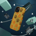 iPhone 13 case with orange and brown paw prints pattern in 6.1 inch variant size floating on abstract blue background
