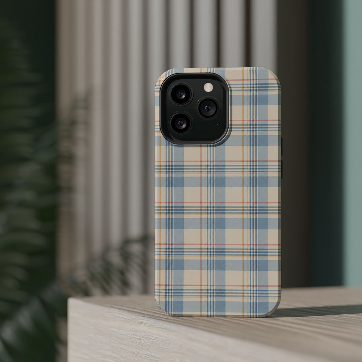 Ranch Check – Blue and Cream Plaid MagSafe Phone Case, glossy square triple-camera Pro model, rear view on a tabletop