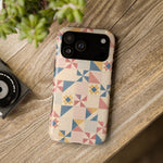 Prairie Quilt – Pastel Patchwork Pattern MagSafe Phone Case, glossy wide-camera Pro Max model, rear view on a wooden surface