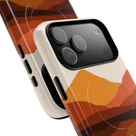 Two smartphone cases with orange and brown abstract mountain design showing different sizes and camera cutouts