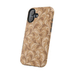 Saddle Scrolls – Tan Western Scrollwork MagSafe Phone Case, glossy vertical dual-camera model, angled rear view