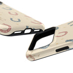 Prairie Horseshoes MagSafe Phone Case, glossy wide-camera Pro Max model, port openings and edge details