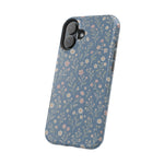 Denim Wildflowers MagSafe Phone Case, glossy vertical dual-camera model, angled rear view