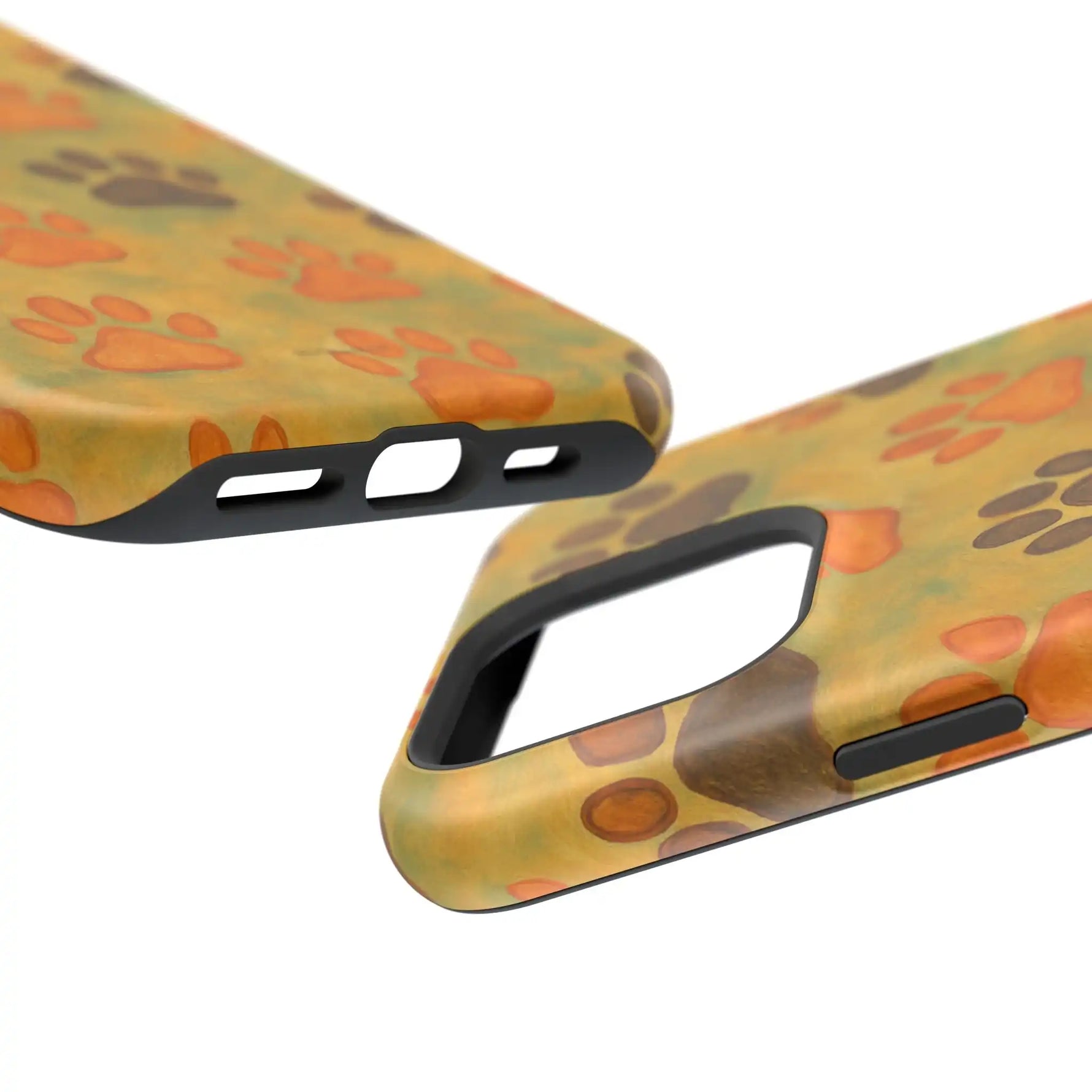 Close-up of eco-friendly phone cases with orange and brown paw print design, showing different model sizes