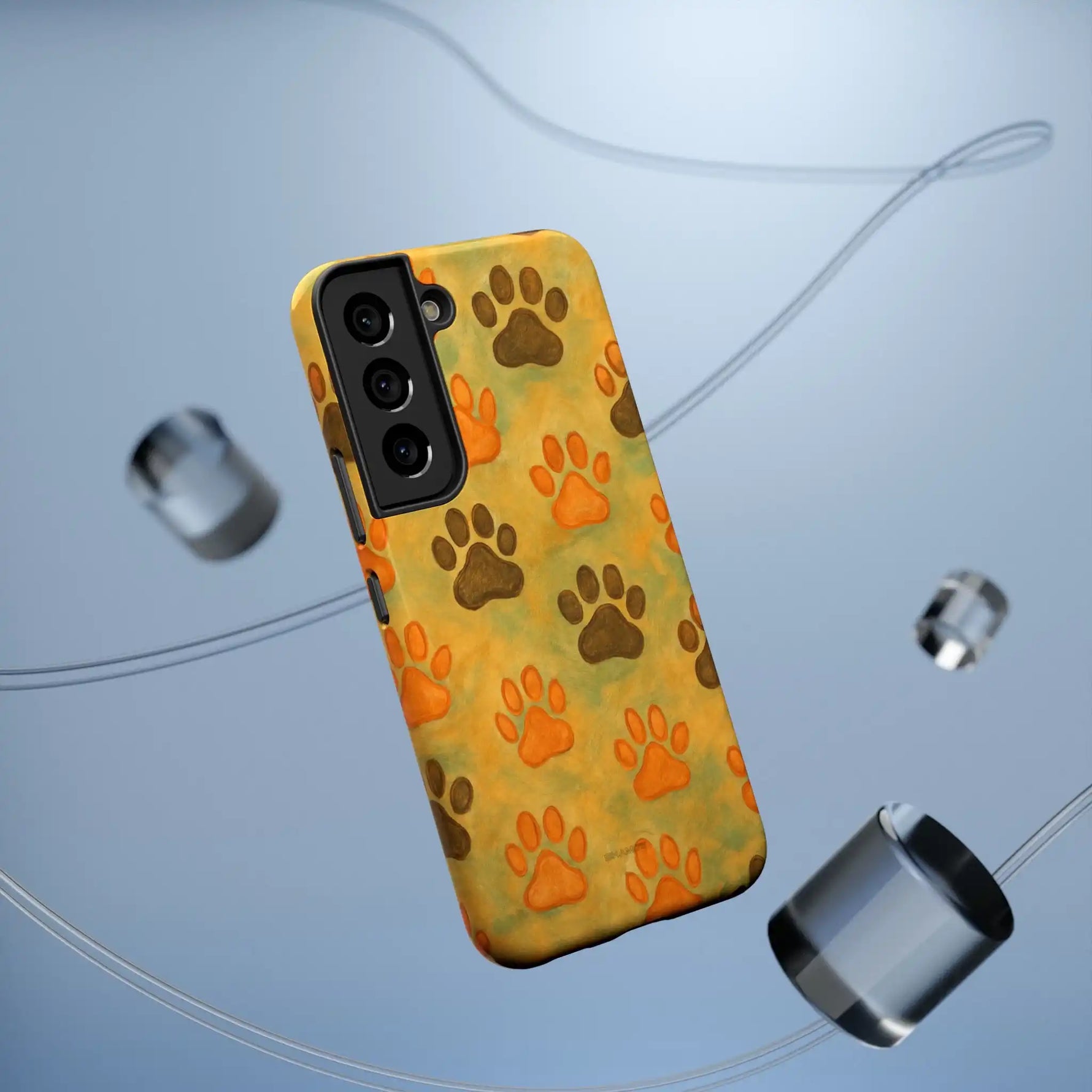 Smartphone case with brown and orange paw print pattern, variant size for multi-lens camera setup
