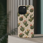 Cactus Bloom – Sage Green Floral Cactus MagSafe Phone Case, glossy square triple-camera Pro model, rear view on a tabletop