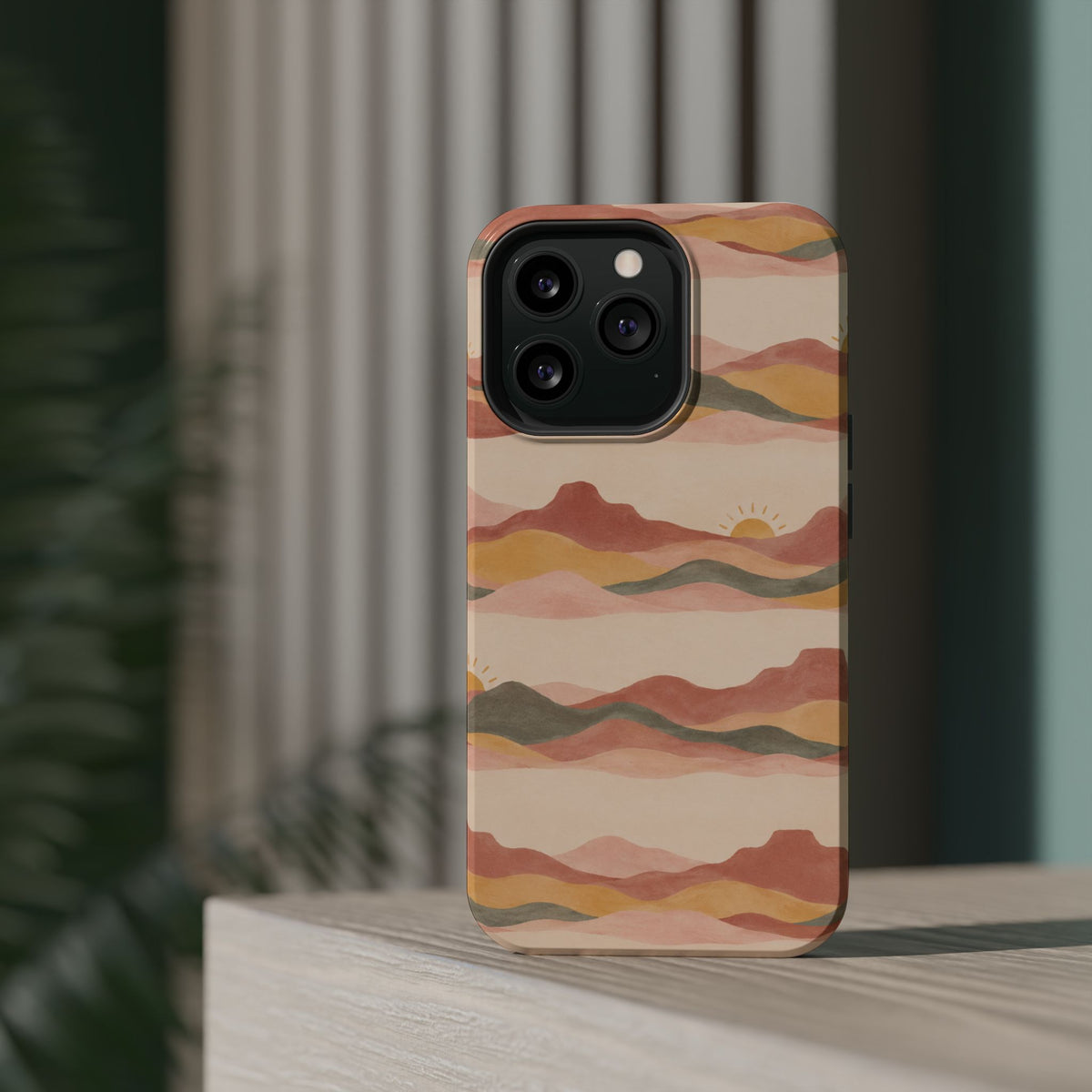 Sunset Trails – Desert Landscape MagSafe Phone Case, glossy square triple-camera Pro model, rear view on a tabletop