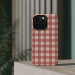 Prairie Gingham MagSafe Phone Case, glossy square triple-camera Pro model, rear view on a tabletop