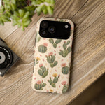 Cactus Bloom – Sage Green Floral Cactus MagSafe Phone Case, glossy wide-camera Pro Max model, rear view on a wooden surface