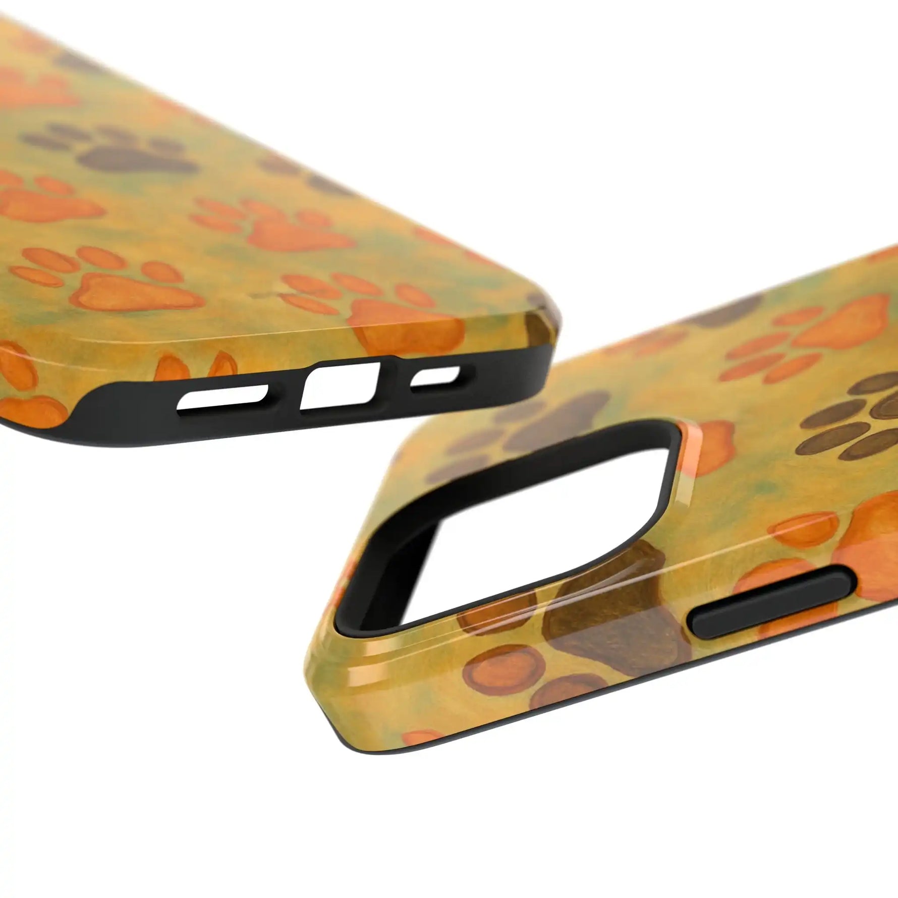Close-up of orange brown paw print phone case showing camera cutout and charging port