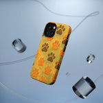 iPhone case with orange and brown paw prints pattern, showing size variant