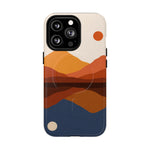 iPhone 14 Pro Max case with abstract sunset mountain landscape design in orange, brown, and blue colors