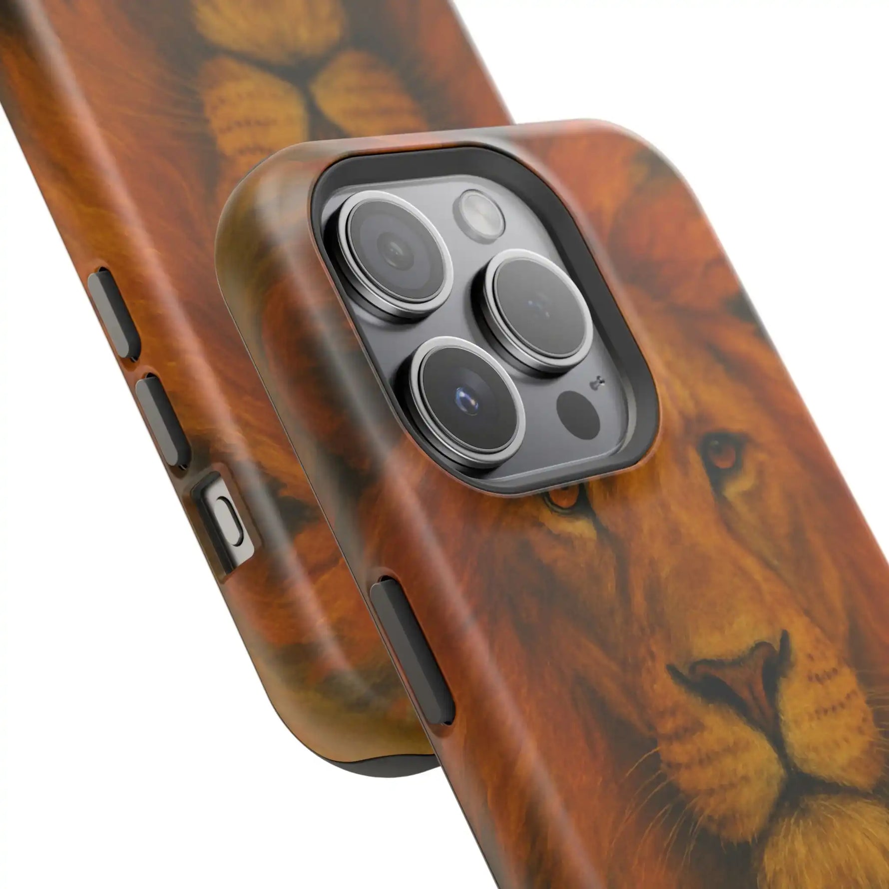 Close-up of two smartphone cases with lion face design showing different phone sizes