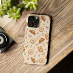 Slanke iPhone-hoes — knus bak- en teddybeerpatroon (recept, hert, knopen)