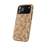 Saddle Scrolls – Tan Western Scrollwork MagSafe Phone Case, glossy wide-camera Pro Max model, angled rear view