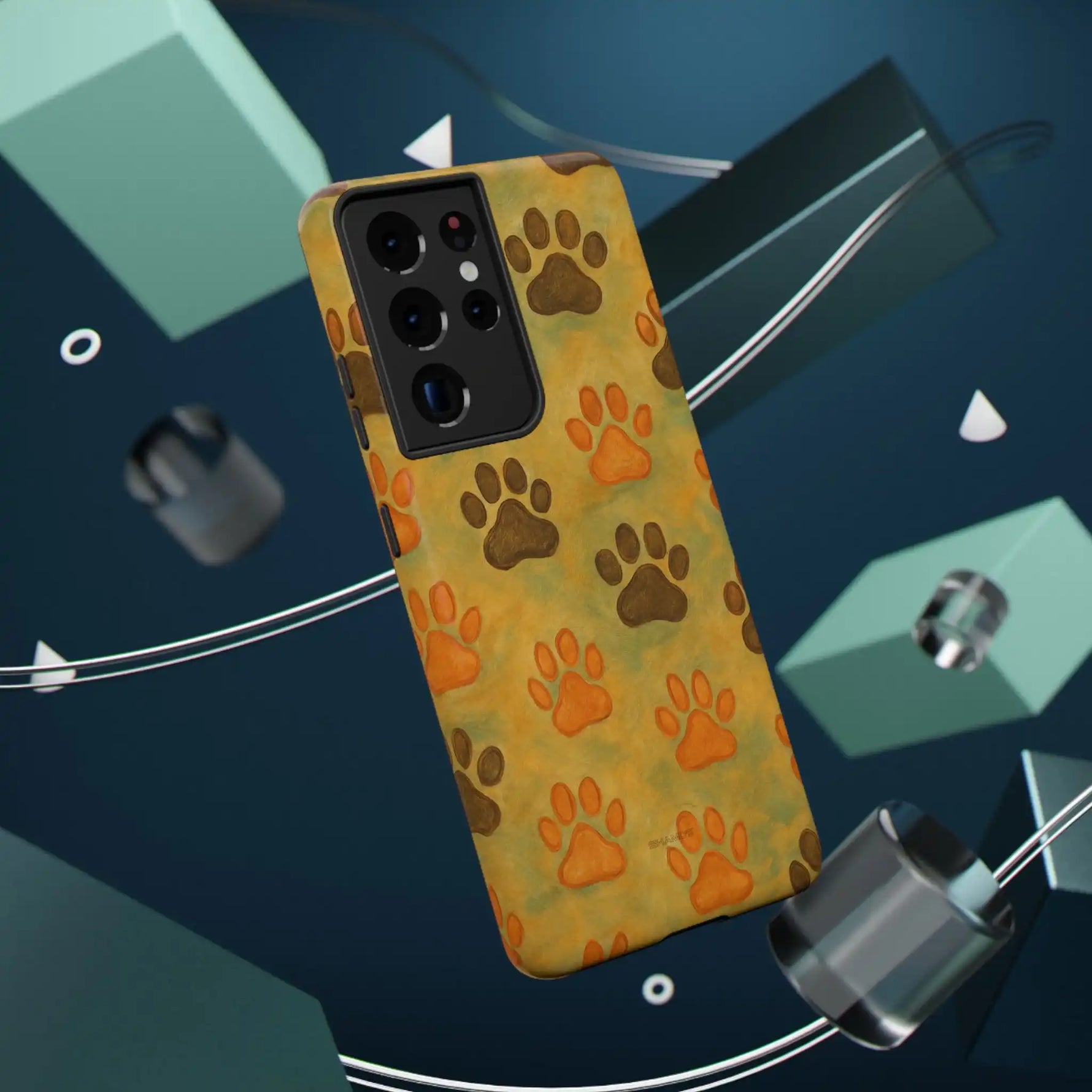 Close-up of large variant smartphone case with orange and brown dog paw prints on yellow background
