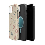 Prairie Horseshoes MagSafe Phone Case, glossy diagonal dual-camera model, exploded shell and liner with magnetic ring