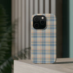 Ranch Check – Blue and Cream Plaid MagSafe Phone Case, glossy square triple-camera Pro model, rear view on a tabletop